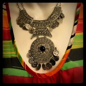 Large circle pendant double chain necklace.